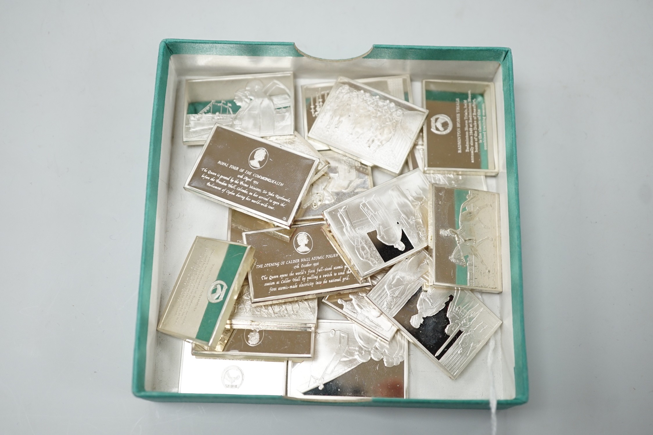 Eighteen silver commemorative ingots (eleven from part of one set and eight from another), 15.4oz.